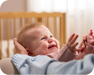 Baby being held